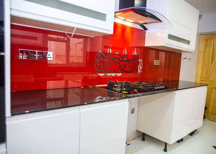arabic red and mirror stencilled glass kitchen splashback