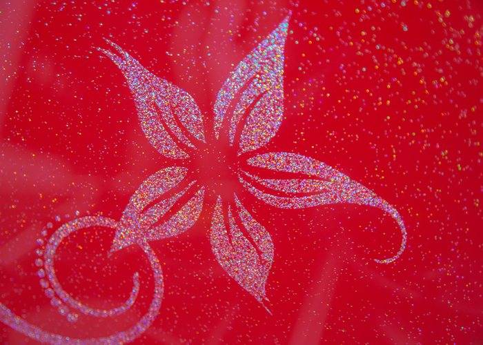 red with rainbow sparkle ganesh stencil close up